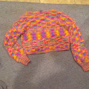 Colorful loose knit sweater.